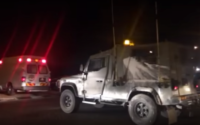 Emergency services at the scene of an explosion next to a West Bank checkpoint outside of the Palestinian village of Hizme, May 10, 2016. (Screencapture) Emergency services at the scene of an explosion next to a West Bank checkpoint outside of the Palestinian village of Hizme, May 10, 2016. (Screencapture)