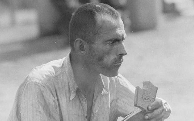 A survivor of the Bergen-Belsen concentration camp eats soon after the camp's liberation by British forces in April 1945 (Imperial War Museum) A survivor of the Bergen-Belsen concentration camp eats soon after the camp's liberation by British forces in April 1945 (Imperial War Museum)