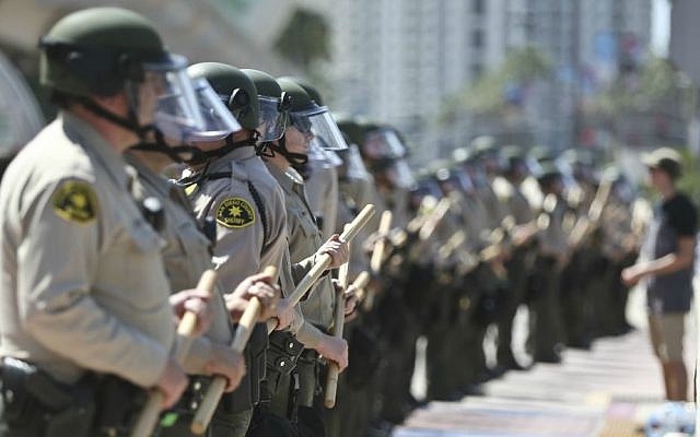 The San Diego County Sheriff Department stands in front of the San Diego Convention Center where Donald Trump spoke Friday, May 27, 2016, in San Diego. (AP Photo/Lenny Ignelzi)