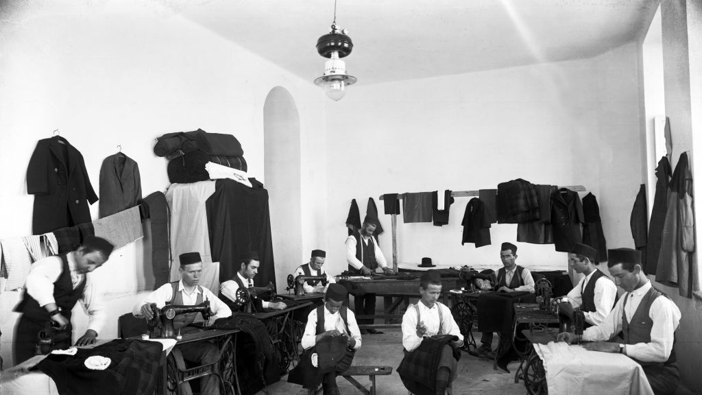Orphans busy tailoring at the Diskin Great Orphanage in Givat Shaul (Courtesy Tsadok Bassan/Central Zionist Archives)