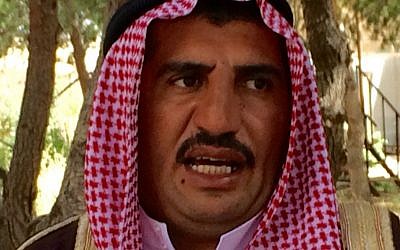 Syrian Arab sheikh Abu Khalid speaks to reporters traveling with US Army Gen. Joseph Votel during a secret visit to northern Syria, Saturday, May 21, 2016. (AP Photo/Robert Burns)