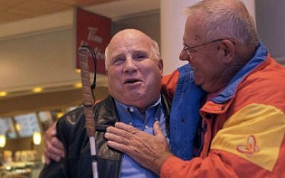 The moment Izak Sagui (right) reunites with his brother Shep Shell, whom he never knew existed, in 'Aida's Secrets.' (Courtesy) The moment Izak Sagui (right) reunites with his brother Shep Shell, whom he never knew existed, in 'Aida's Secrets.' (Courtesy)