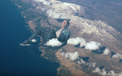 Chris Martin as a giant in the video of his new single 'Up&Up,' created by Jerusalemite Vania Heymann and released on May 16, 2016. (YouTube: screenshot)