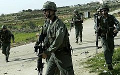 Illustrative photo of border police near the West Bank village of Bidu and the security barrier. (David Furst Flash90)