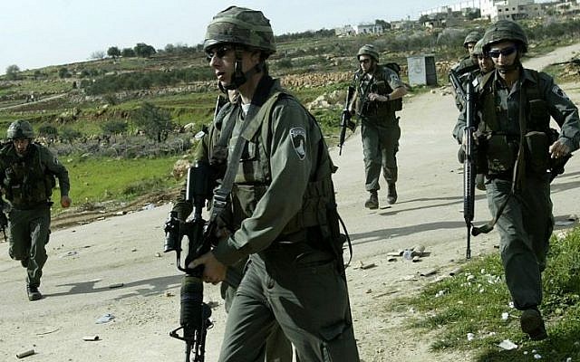 Illustrative photo of border police near the West Bank village of Bidu and the security barrier. (David Furst Flash90) Illustrative photo of border police near the West Bank village of Bidu and the security barrier. (David Furst Flash90)