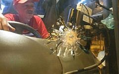 An armored Israeli bus came under Palestinian fire on May 21, 2016 near the Tekoa settlement in the West Bank. No injuries were reported. (Courtesy)