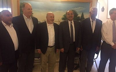 Joint (Arab) List MKs Ahmad Tibi (C) and Taleb Abu Arar (L) seen with members of a visiting delegation of US congressmen in Jerusalem on May 28, 2016. (Courtesy Joint List)