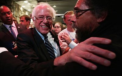 Democratic presidential candidate Sen. Bernie Sanders (left) and philosopher Cornel West (right) at the second Democratic presidential debate in Des Moines, Iowa, on November 14, 2015. (Alex Wong/Getty Images via JTA)