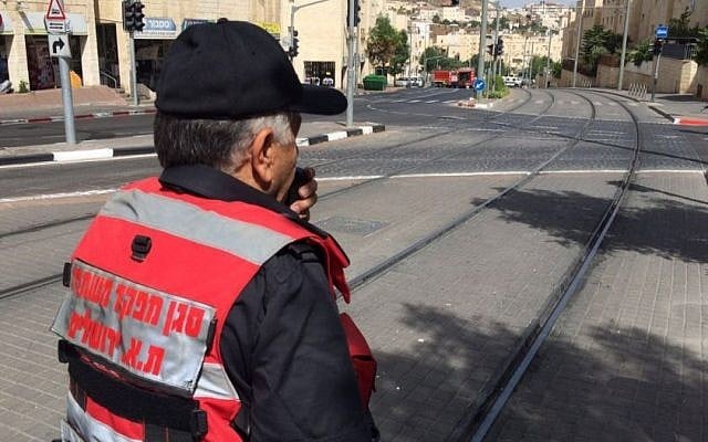 Emergency crews work to clear Jerusalem's Moshe Dayan Boulevard after an unknown chemical leaked from a truck on May 17, 2016. (Jerusalem Fire and Rescue Services) Emergency crews work to clear Jerusalem's Moshe Dayan Boulevard after an unknown chemical leaked from a truck on May 17, 2016. (Jerusalem Fire and Rescue Services)