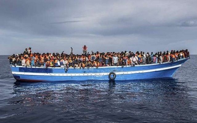 Italian coast guard rescues migrants off the coast of Sicily, May 12, 2016. (Italian Navy/Massimo Sestini via UNHCR Italia) Italian coast guard rescues migrants off the coast of Sicily, May 12, 2016. (Italian Navy/Massimo Sestini via UNHCR Italia)