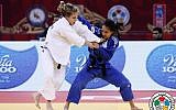 Israeli judoka Gili Cohen (in blue) takes on her competitor at the Grand Slam in Baku on May 6, 2016 (photo: G. Sabau/IJF Media)
