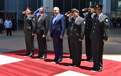Newly appointed Defense Minister Avigdor Liberman alongside IDF Chief of Staff Gadi Eisenkott during a ceremony welcoming him to the ministry, May 31, 2016. (Ariel Harmoni/Ministry of Defense) Newly appointed Defense Minister Avigdor Liberman alongside IDF Chief of Staff Gadi Eisenkott during a ceremony welcoming him to the ministry, May 31, 2016. (Ariel Harmoni/Ministry of Defense)