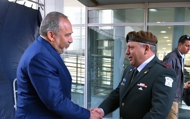 Then-newly appointed Defense Minister Avigdor Liberman alongside IDF Chief of Staff Gadi Eisenkott during a ceremony welcoming him to the ministry, May 31, 2016. (Ariel Harmoni/Ministry of Defense) Then-newly appointed Defense Minister Avigdor Liberman alongside IDF Chief of Staff Gadi Eisenkott during a ceremony welcoming him to the ministry, May 31, 2016. (Ariel Harmoni/Ministry of Defense)