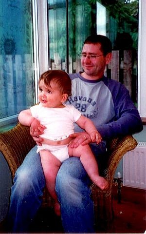 Author Jem Lester holds his son Noah as a baby. Like the novel's Jonah character, Noah is on the autistic spectrum and requires special care (courtesy) Author Jem Lester holds his son Noah as a baby. Like the novel's Jonah character, Noah is on the autistic spectrum and requires special care (courtesy)