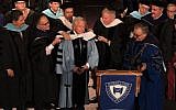 Robert Kraft being 'hooded' at the Yeshiva University commencement in New York City, May 26, 2016. (Adena Stevens/Yeshiva University via JTA)