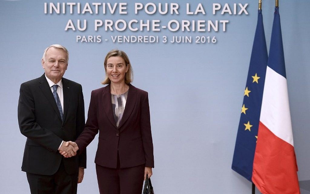 European Union High Representative for Foreign Affairs, Federica Mogherini, right, is welcomed by French Foreign minister Jean-Marc Ayrault prior to an international and interministerial meeting in a bid to revive the Israeli-Palestinian peace process, in Paris, on June 3, 2016. (AFP/Pool/Stephane de Sakutin)