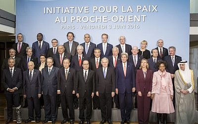 French President Francois Hollande (C), United Nations Secretary General Ban Ki-moon (C-L), French Foreign Minister Jean-Marc Ayrault (C-R), US Secretary of State John Kerry (4th R), European Union High Representative for Foreign Affairs, Federica Mogherini (3rd R) and officials pose for a group photo at an international meeting in a bid to revive the Israeli-Palestinian peace process in Paris, on June 3, 2016. (AFP Photo/Pool/Kamil Zihnioglu) French President Francois Hollande (C), United Nations Secretary General Ban Ki-moon (C-L), French Foreign Minister Jean-Marc Ayrault (C-R), US Secretary of State John Kerry (4th R), European Union High Representative for Foreign Affairs, Federica Mogherini (3rd R) and officials pose for a group photo at an international meeting in a bid to revive the Israeli-Palestinian peace process in Paris, on June 3, 2016. (AFP Photo/Pool/Kamil Zihnioglu)