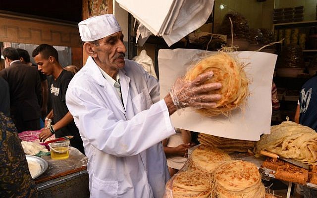 A pastry vendor sells various oriental pancakes the day before the start of Ramadan on June 6, 2016 in the old medina of Rabat, Morocco. (Fadel Senna/AFP)