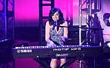 This photo taken on April 20, 2016 shows singer Christina Grimmie performing at What's Trending's Fourth Annual Tubeathon Benefitting the American Red Cross on April 20, 2016 in Burbank. Grimmie, who starred in NBC's "The Voice", was shot and killed at a concert in Orlando, Florida late June 10 by an unidentified gunman, who then fatally shot himself, police said. (AFP PHOTO / GETTY IMAGES NORTH AMERICA / Viven Killilea)