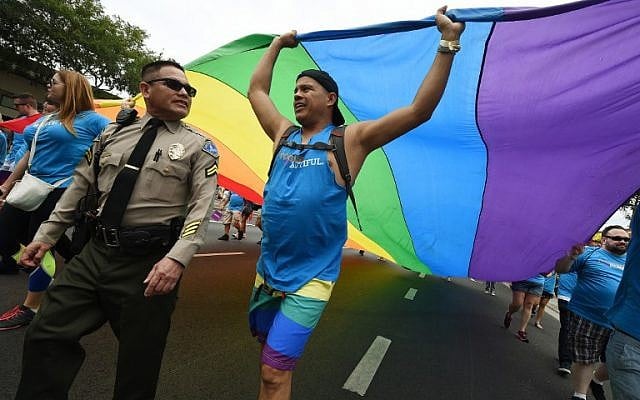 Sheriff's deputies provide security during the 2016 Gay Pride Parade on June 12, 20116 in Los Angeles, California.(AFP PHOTO / Mark Ralston)