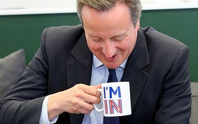 Britain's Prime Minister David Cameron sips from an "I'm In" mug as he meets television presenters Jeremy Clarkson and James May during a visit to W Chump & Sons Ltd TV studio in west London on June 16, 2016 ahead of the EU referendum as the prime minister campaigns to avoid a Brexit. (AFP PHOTO / POOL / Gareth Fuller) Britain's Prime Minister David Cameron sips from an "I'm In" mug as he meets television presenters Jeremy Clarkson and James May during a visit to W Chump & Sons Ltd TV studio in west London on June 16, 2016 ahead of the EU referendum as the prime minister campaigns to avoid a Brexit. (AFP PHOTO / POOL / Gareth Fuller)