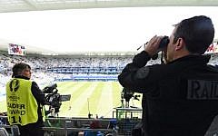A member of the French special forces RAID monitors the surrounding area ahead of the Euro 2016 group E football match between Belgium and Ireland at the Matmut Atlantique stadium in Bordeaux on June 18, 2016. (AFP PHOTO / Mehdi FEDOUACH)