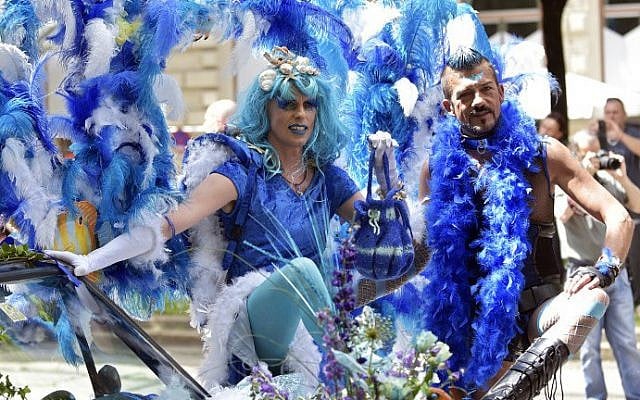 People take part in the Gay Pride Rainbow Parade in Vienna, Austria, on June 18, 2016. (Hans Punz/APA/AFP) People take part in the Gay Pride Rainbow Parade in Vienna, Austria, on June 18, 2016. (Hans Punz/APA/AFP)