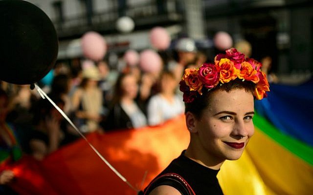 A woman smiles as she takes part in the Ljubljana Pride Parade in Ljubljana, Slovenia, on June 18, 2016.
(Jure Makovec/AFP) A woman smiles as she takes part in the Ljubljana Pride Parade in Ljubljana, Slovenia, on June 18, 2016.
(Jure Makovec/AFP)