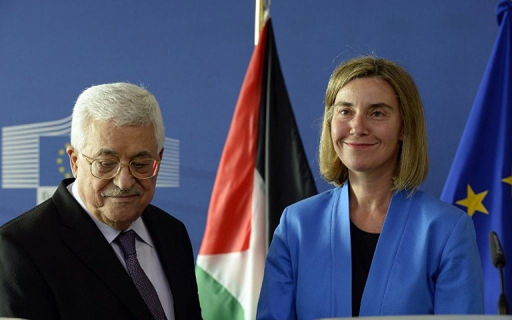 European Union High Representative for Foreign Affairs and Security Policy Federica Mogherini and President of the Palestinian National Authority Mahmud Abbas (L) address the media after a meeting at the European Union Commission headquarters in Brussels on June 22, 2016.(AFP PHOTO / THIERRY CHARLIER)