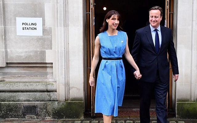 British Prime Minister David Cameron and his wife Samantha leave after casting their votes in the EU referendum, at a polling station in London on June 23, 2016. AFP/LEON NEAL)