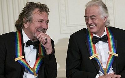 This file photo taken on December 02, 2012 shows 
Led Zeppelin band members Robert Plant (L) and Jimmy Page during an event at the White House in Washington, DC, for the 2012 Kennedy Center Honorees. (AFP PHOTO / BRENDAN SMIALOWSKI)