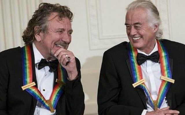 This file photo taken on December 02, 2012 shows
Led Zeppelin band members Robert Plant (L) and Jimmy Page during an event at the White House in Washington, DC, for the 2012 Kennedy Center Honorees. (AFP PHOTO / BRENDAN SMIALOWSKI) This file photo taken on December 02, 2012 shows
Led Zeppelin band members Robert Plant (L) and Jimmy Page during an event at the White House in Washington, DC, for the 2012 Kennedy Center Honorees. (AFP PHOTO / BRENDAN SMIALOWSKI)