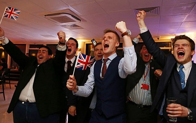 Leave EU supporters wave Union flags and cheer as the results come in at the Leave.EU referendum party at Millbank Tower in central London early in the morning of June 24, 2016.(AFP PHOTO / GEOFF CADDICK) Leave EU supporters wave Union flags and cheer as the results come in at the Leave.EU referendum party at Millbank Tower in central London early in the morning of June 24, 2016.(AFP PHOTO / GEOFF CADDICK)