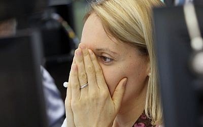 A broker reacts at the German stock exchange in Frankfurt, Germany, on June 24, 2016.(AFP PHOTO / DANIEL ROLAND)