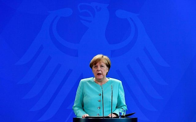 German chancellor Angela Merkel addresses journalists after meeting with German parliamentary groups and ministers to discuss the so-called Brexit referendum at the Chancellery on June 24, 2016 in Berlin. (AFP PHOTO / John MACDOUGALL)