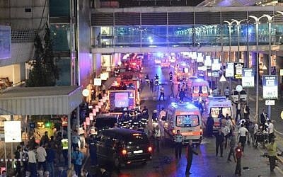 This picture obtained from the Ilhas News Agency shows ambulances and police setting up a perimeter after two explosions followed by gunfire hit Ataturk Airport in Istanbul, on June 28, 2016. (AFP PHOTO/ILHAS NEWS AGENCY)