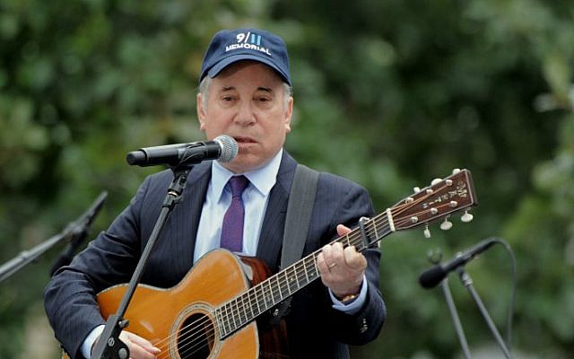 This file photo taken on September 11, 2011 shows singer Paul Simon as he performs “Sounds of Silence” during the 10th Anniversary commemoration of the September 11, 2001 attacks at the lower Manhattan site of the World Trade Center in New York. (Stan Honda/AFP) This file photo taken on September 11, 2011 shows singer Paul Simon as he performs “Sounds of Silence” during the 10th Anniversary commemoration of the September 11, 2001 attacks at the lower Manhattan site of the World Trade Center in New York. (Stan Honda/AFP)