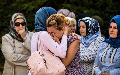 Relatives of suicide bombing victim Mohammad Eymen Demirci mourn on June 29, 2016 in Istanbul during his funeral a day after a terrorist attack targeted Istanbul's Ataturk airport, killing 41 people. (AFP PHOTO/OZAN KOSE)