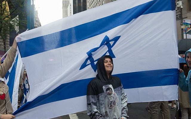 People participate in the Celebrate Israel Parade in the rain on June 5, 2016 in New York City (Stephanie Keith/Getty Images/AFP) People participate in the Celebrate Israel Parade in the rain on June 5, 2016 in New York City (Stephanie Keith/Getty Images/AFP)