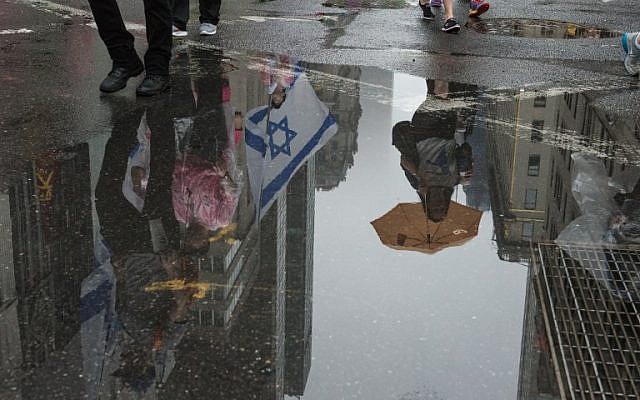People participate in the Celebrate Israel Parade in the rain on June 5, 2016 in New York City (Stephanie Keith/Getty Images/AFP) People participate in the Celebrate Israel Parade in the rain on June 5, 2016 in New York City (Stephanie Keith/Getty Images/AFP)