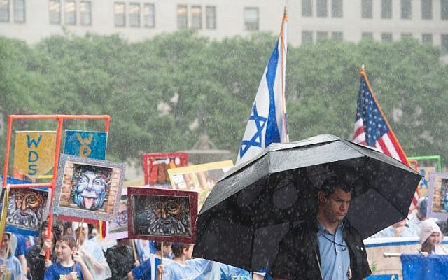 People participate in the Celebrate Israel Parade in the rain on June 5, 2016 in New York City (Stephanie Keith/Getty Images/AFP) People participate in the Celebrate Israel Parade in the rain on June 5, 2016 in New York City (Stephanie Keith/Getty Images/AFP)
