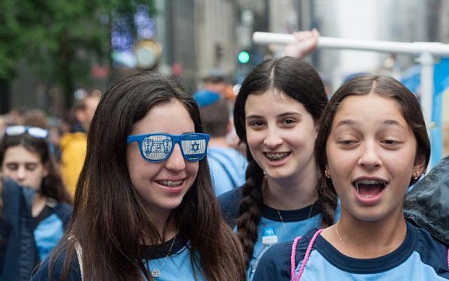 People participate in the Celebrate Israel Parade in the rain on June 5, 2016 in New York City (Stephanie Keith/Getty Images/AFP) People participate in the Celebrate Israel Parade in the rain on June 5, 2016 in New York City (Stephanie Keith/Getty Images/AFP)