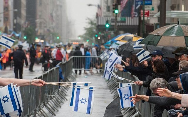 People participate in the Celebrate Israel Parade in the rain on June 5, 2016 in New York City (Stephanie Keith/Getty Images/AFP) People participate in the Celebrate Israel Parade in the rain on June 5, 2016 in New York City (Stephanie Keith/Getty Images/AFP)