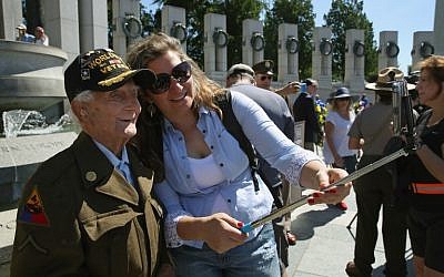 96 year old D-Day veteran George Krakosky has his picture taken during a D-Day anniversary wreath laying ceremony at the National World War II Memorial on June 6, 2016 in Washington, DC. (Mark Wilson/Getty Images/AFP)