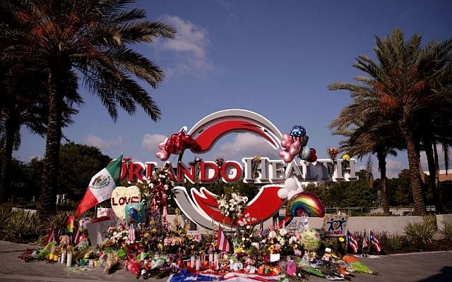 A makeshift memorial for the victims of the Pulse nightclub shooting is set up close to the nearby Orlando Regional Medical Center in Orlando, Florida, June 15, 2016. (Drew Angerer/Getty Images/AFP)