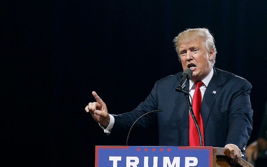 Republican presidential candidate Donald Trump speaks to a crowd of supporters during a campaign rally on June 18, 2016 in Phoenix, Arizona. Trump returned to Arizona for the fourth time since starting his presidential campaign a year ago.  (Ralph Freso/Getty Images/AFP)