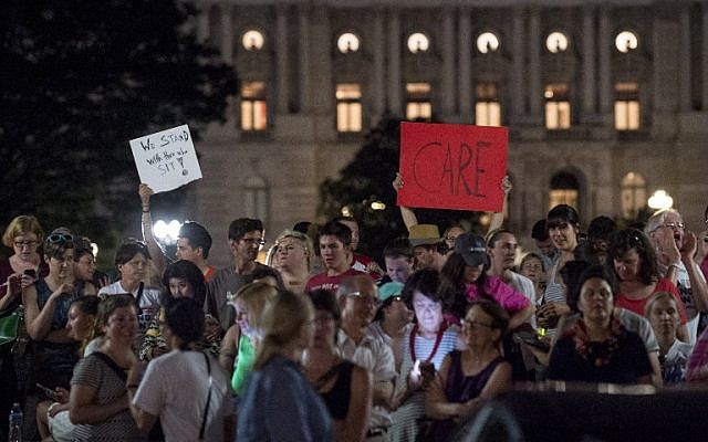 Supporters of House Democrats taking part in a sit-in on the House Chamber shout encouragement from outside the U.S. Capitol on June 22, 2016 in Washington, DC. (Pete Marovich/Getty Images/AFP)