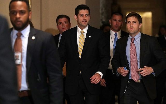 US Speaker of the House Rep. Paul Ryan, center, arrives for votes as House Democrats stages a sit-in on the House floor June 22, 2016 on Capitol Hill in Washington, DC. (Alex Wong/Getty Images/AFP)