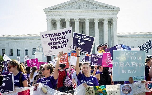 Illustrative: Pro-choice and pro-life activists demonstrate on the steps of the United States Supreme Court in Washington, DC, on June 27, 2016. (Pete Marovich/Getty Images/AFP) Illustrative: Pro-choice and pro-life activists demonstrate on the steps of the United States Supreme Court in Washington, DC, on June 27, 2016. (Pete Marovich/Getty Images/AFP)