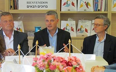 Head of the Kfar HaVradim Local Council, Sivan Yehieli (center) signs a twinning agreement with the head of the Spanish town Castrillo Mota de Judios (left), June 19, 2016. The ceremony was attended by the Spanish ambassador to Israel, Fernando Carderera (right).  (Kfar HaVradim Local Council)